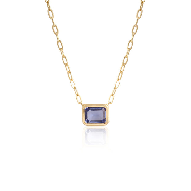 Delicate Lt Blue Rectangle Solitaire in Yellow Gold