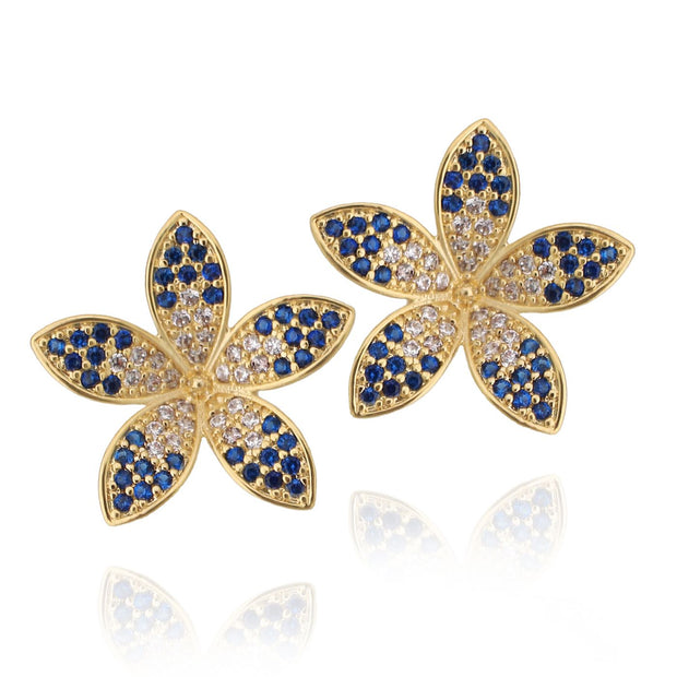 Blue CZ Pointy Flower Studs In Yellow Gold